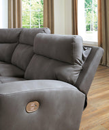 Ashley Furniture Next-Gen DuraPella power reclining sectional loveseat with console, featuring plush cushions and modern design.