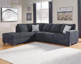 Ashley Furniture Altari Sleeper Sectional with Chaise, modern sectional sofa with chaise and fold-out bed in neutral fabric.