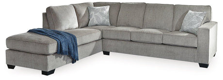 Ashley Furniture Altari Sleeper Sectional with Chaise showing plush fabric, modern design, and attached chaise lounge in a cozy living room setting.