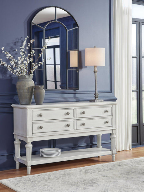 Ashley Furniture Montelaine dining server with wooden finish, featuring multiple drawers and cabinet storage for elegant dining room organization.