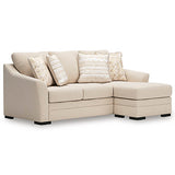 Ashley Furniture Lango Sofa Chaise Sleeper with angled view, plush fabric and convertible sleeper feature in a modern design.