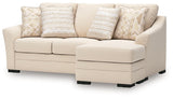 Ashley Furniture Lango Sleeper Sofa with chaise, featuring plush cushions and a modern design, shown from an angled view.