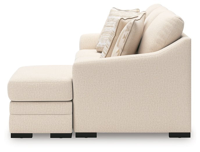Ashley Furniture Lango sofa chaise sleeper with plush fabric and modern design, shown from a side angle.
