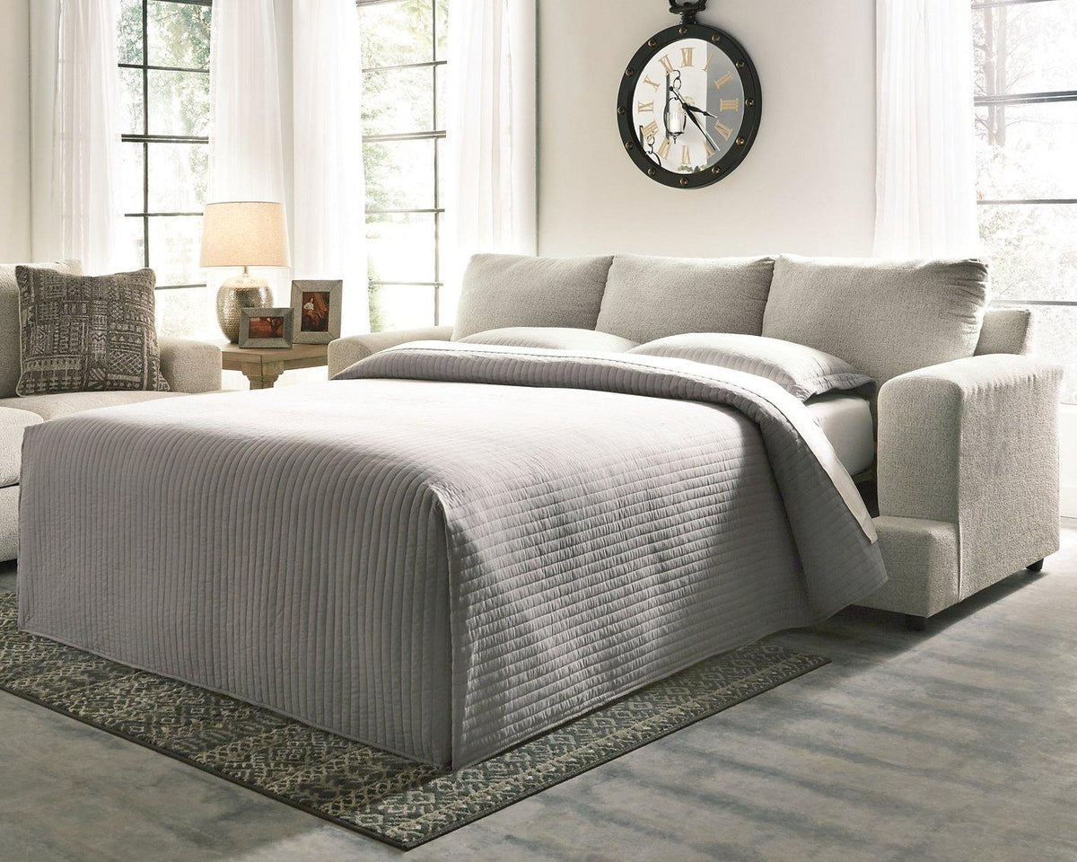 Ashley Furniture Soletren sofa sleeper with plush fabric, showing its modern design and convertible sleeper feature.