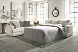 Ashley Furniture Soletren Sofa Sleeper with plush fabric and convertible design, perfect for cozy living room seating and sleeping space.