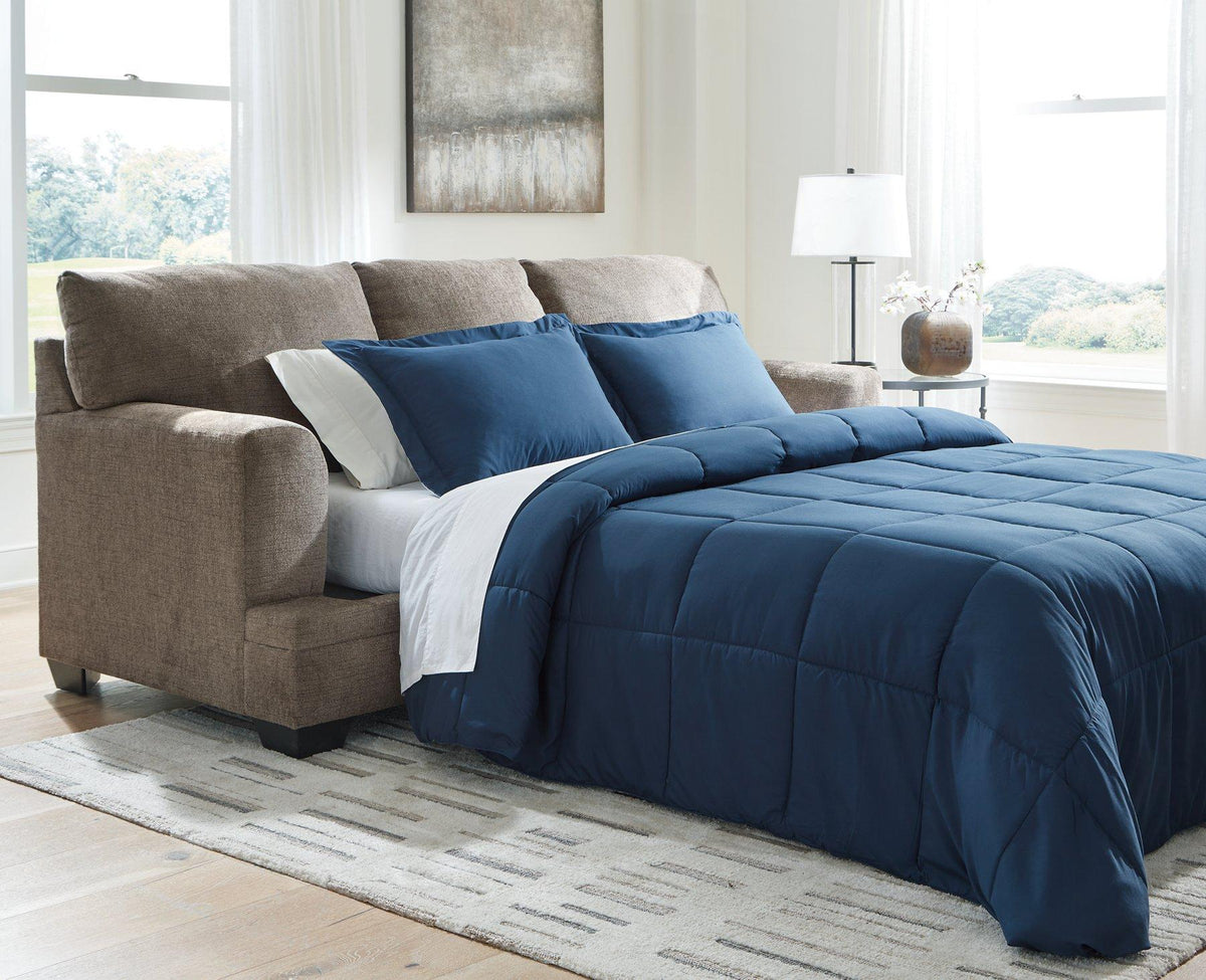 Ashley Furniture Stonemeade sofa sleeper with plush fabric and convertible bed in a stylish living room setting.