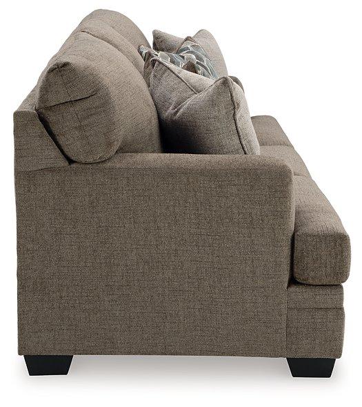 Ashley Furniture Stonemeade sofa sleeper with plush fabric, convertible design, and comfortable sleeping surface.