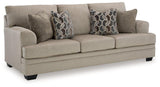 Ashley Furniture Stonemeade sofa sleeper showing a modern fabric sofa with a pulled-out bed in a living room setting.