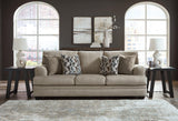 Ashley Furniture Stonemeade sofa sleeper with plush fabric, featuring a fold-out bed and comfortable seating in a modern living room setting.