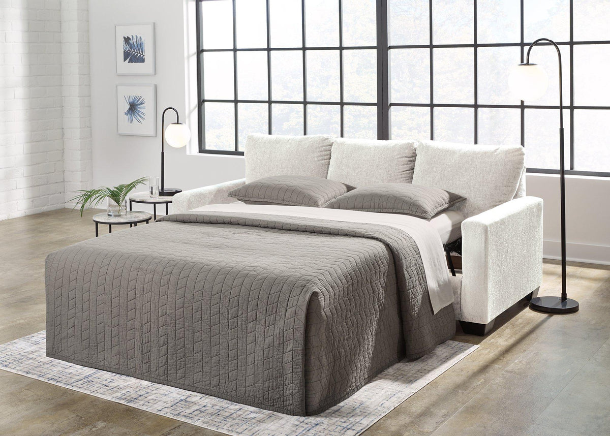 Ashley Furniture Rannis sofa sleeper with plush cushions and modern design, perfect for versatile living room seating and sleeping arrangements.