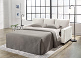Ashley Furniture Rannis sofa sleeper with plush cushions and modern design, perfect for versatile living room seating and sleeping arrangements.