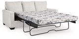 Ashley Furniture Rannis sleeper sofa, shown in a modern living room setting with plush cushions and a sleek design.