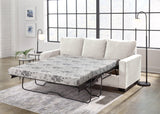 Ashley Furniture Rannis sofa sleeper with plush fabric and convertible design, shown in a modern living room setting.