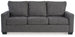 Ashley Furniture Rannis sofa sleeper showing a modern gray sleeper sofa with plush cushions and a pull-out bed feature.