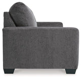 Ashley Furniture Rannis sofa sleeper with plush fabric, shown in a modern living room setting, featuring a comfortable sleeping surface.