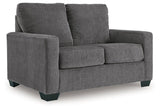 Ashley Furniture Rannis sofa sleeper with plush fabric and modern design, shown as a versatile living room piece.
