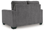Ashley Furniture Rannis Sofa Sleeper with plush fabric, featuring a compact design and fold-out bed for versatile living space.