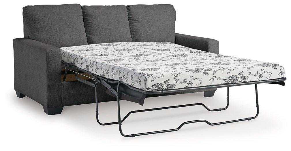 Ashley Furniture Rannis sofa sleeper with plush cushions and a modern design, shown as a versatile living room piece