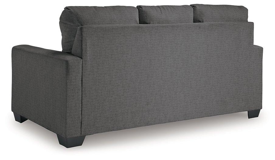 Ashley Furniture Rannis Sofa Sleeper with plush fabric and fold-out bed, designed for comfort and versatile living space.