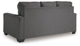 Ashley Furniture Rannis Sofa Sleeper with plush fabric and fold-out bed, designed for comfort and versatile living space.
