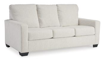 Ashley Furniture Rannis sofa sleeper with plush fabric, featuring a fold-out bed and modern design for versatile living space.