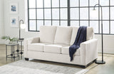 Ashley Furniture Rannis sofa sleeper, showcasing a modern sleeper sofa with plush cushions and neutral fabric upholstery.