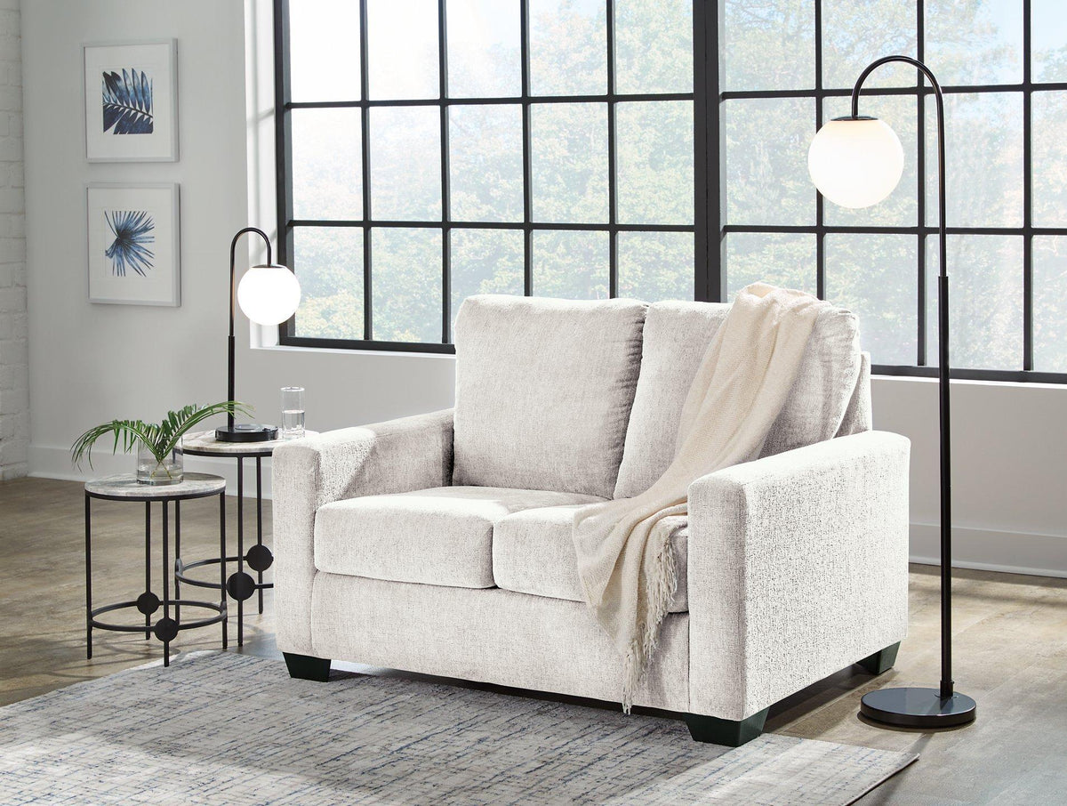 Ashley Rannis sofa sleeper with plush fabric and convertible design, perfect for versatile seating and sleeping arrangements.