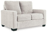 Ashley Furniture Rannis sofa sleeper with plush upholstery and fold-out bed for versatile seating and sleeping comfort.