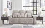 Ashley Furniture Boyington Power Reclining Sofa with plush cushions and dark upholstery, designed for comfort and style.