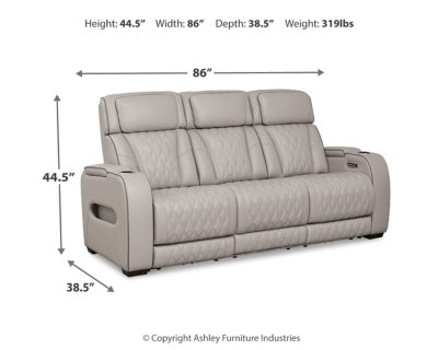 Ashley Furniture Boyington Power Reclining Sofa with plush cushions and reclining features, shown in a dark gray fabric.