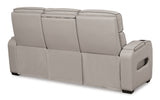 Ashley Furniture Boyington Power Reclining Sofa with plush back cushions and recliner mechanisms, shown from the back in the image.