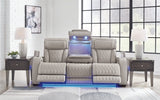 Ashley Furniture Boyington power reclining sofa with plush cushions and dark upholstery, showcasing its comfortable, modern design.