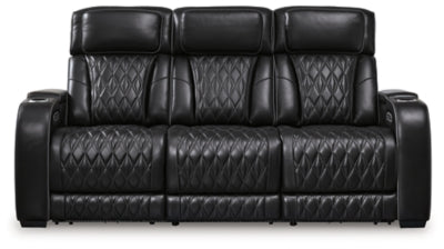 Ashley Furniture Boyington power reclining sofa with plush upholstery, showcasing its comfortable design and reclining feature.