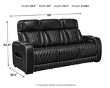 Ashley Furniture Boyington Power Reclining Sofa with plush cushions and dark upholstery, showcasing its modern design and reclining features.