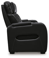 Boyington Power Reclining Sofa by Ashley Furniture, side view showing plush fabric and reclining mechanism in a modern living room setting.