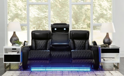 Ashley Furniture Boyington Power Reclining Sofa with plush fabric and modern design, featuring adjustable headrests and reclining features.
