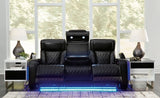 Ashley Furniture Boyington Power Reclining Sofa with plush fabric and modern design, featuring adjustable headrests and reclining features.
