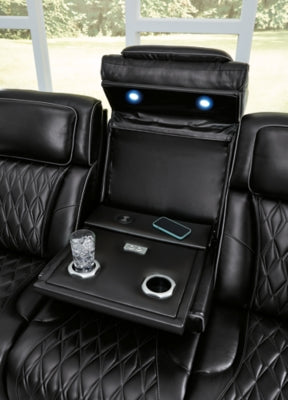 Ashley Furniture Boyington Power Reclining Sofa with plush cushions and reclining features, shown in a detailed view.