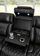 Ashley Furniture Boyington Power Reclining Sofa with plush cushions and reclining features, shown in a detailed view.