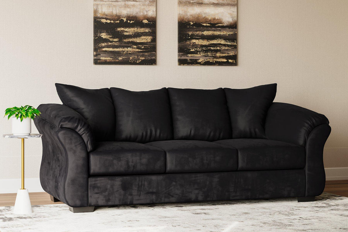 Ashley Furniture Darcy Sofa with plush beige upholstery and modern design, shown in a stylish living room setting.