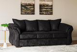 Ashley Furniture Darcy Sofa with plush beige upholstery and modern design, shown in a stylish living room setting.