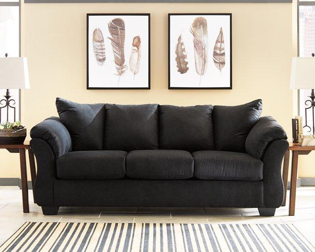 Ashley Furniture Darcy Sofa with plush cushions and stylish fabric upholstery, perfect for modern living rooms.