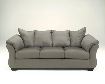 Ashley Furniture Darcy Sofa with plush fabric and modern design, featuring wide cushions and sleek armrests.