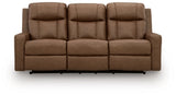 Ashley Furniture Mackmenville Reclining Sofa with plush cushions and wood accents, shown from a front head-on view.
