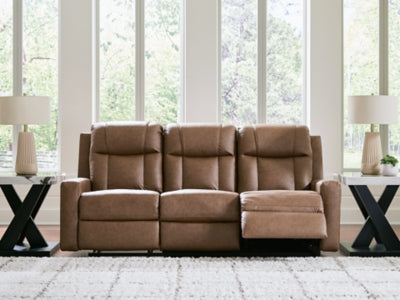 Ashley Furniture Mackmenville reclining sofa in open position, plush fabric with padded armrests and comfortable seating.