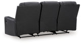 Ashley Furniture Mackmenville reclining sofa with plush cushions and wide armrests, shown from the back view.