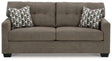 Ashley Furniture Mahoney sofa with plush cushions and modern design, shown in a cozy living room setting.