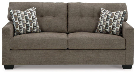 Ashley Furniture Mahoney sofa with plush cushions and modern design, shown in a cozy living room setting.