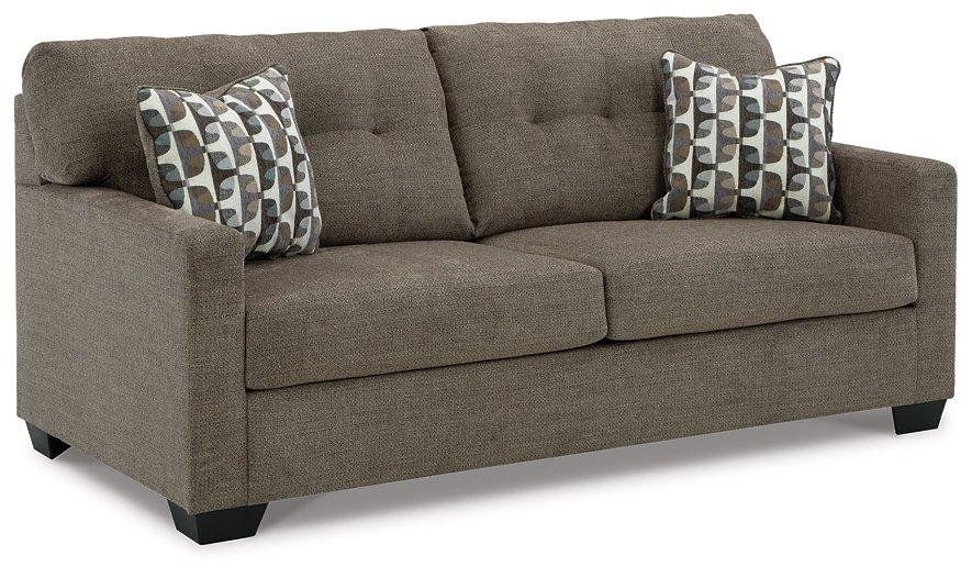 Ashley Furniture Mahoney Sofa with plush cushions and modern design, shown in a cozy living room setting.