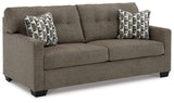 Ashley Furniture Mahoney Sofa with plush cushions and modern design, shown in a cozy living room setting.